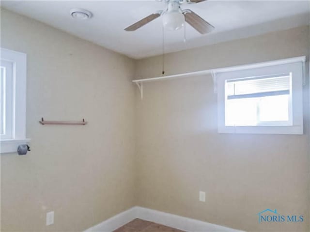 empty room featuring ceiling fan