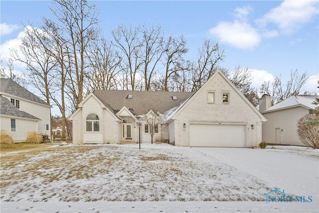 view of front of property with a garage