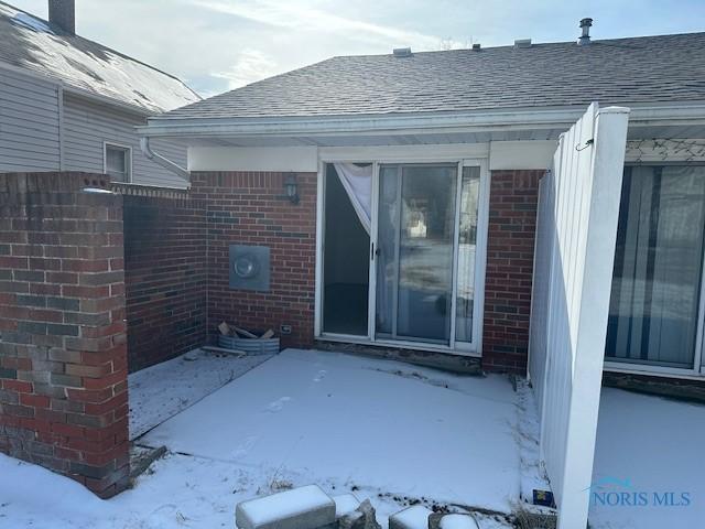 view of snow covered patio