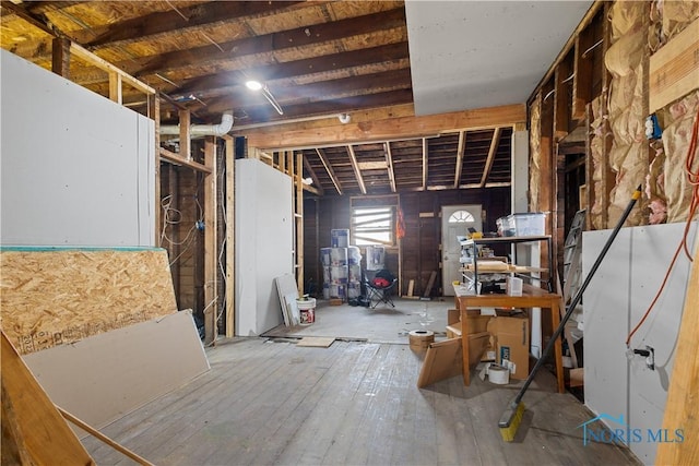 miscellaneous room featuring hardwood / wood-style flooring