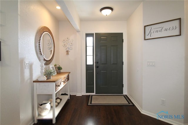 foyer featuring dark hardwood / wood-style floors