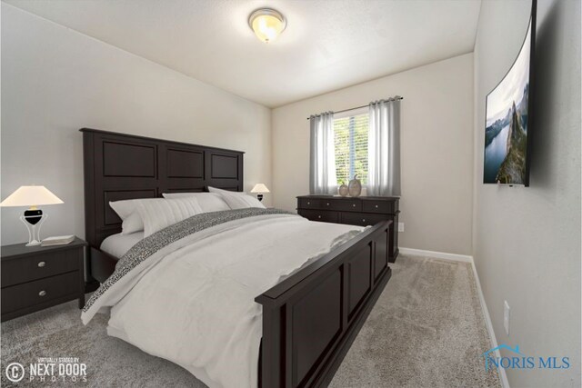 bedroom featuring light colored carpet