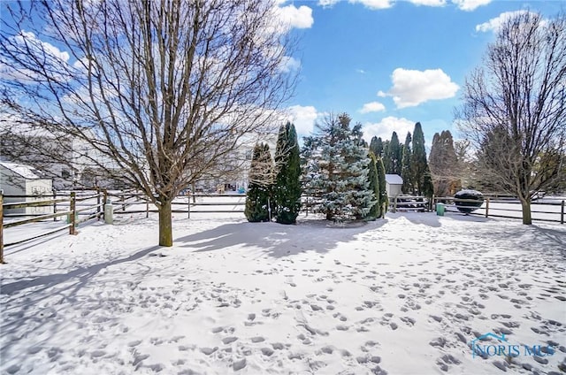 view of snowy yard