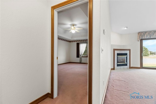 hallway featuring carpet