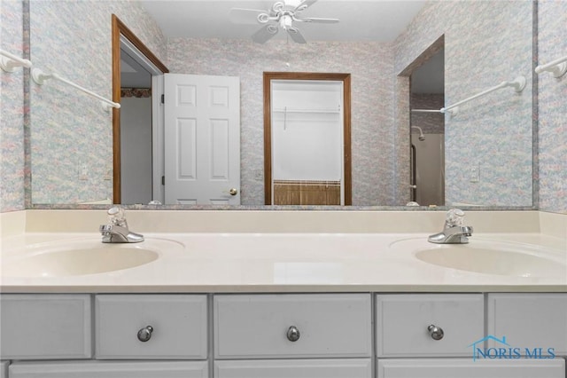 bathroom with vanity and ceiling fan