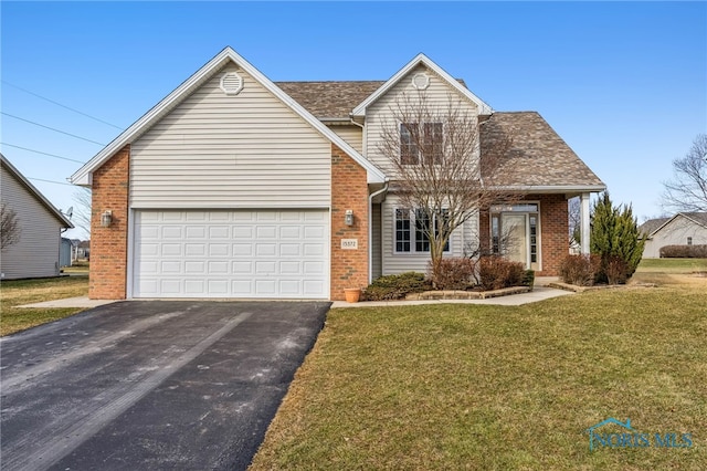 front of property featuring a garage and a front yard