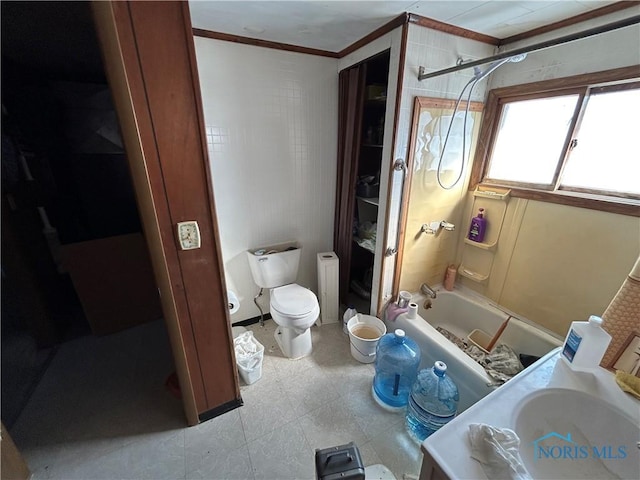 full bathroom featuring toilet, crown molding, shower / tub combination, vanity, and radiator