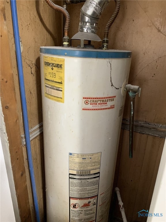 utility room with water heater