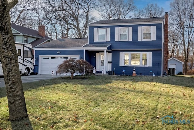 front facade featuring a garage, a front lawn, and central air condition unit