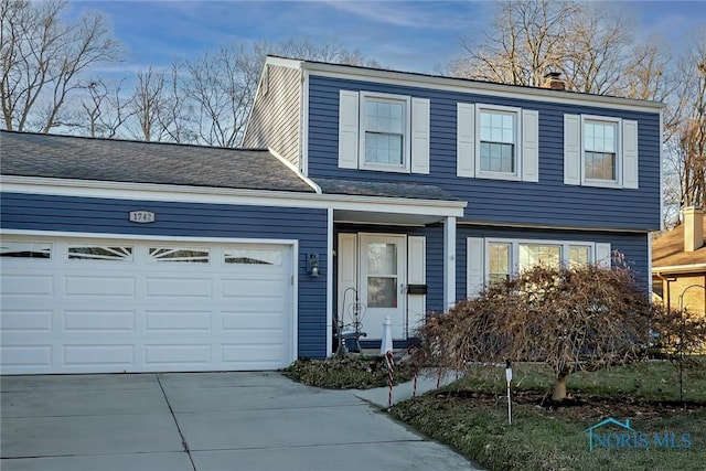 view of property featuring a garage