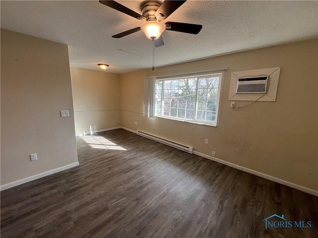 empty room with a textured ceiling, an AC wall unit, a baseboard radiator, dark hardwood / wood-style floors, and ceiling fan