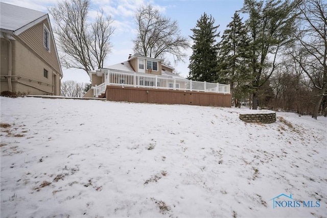 view of yard covered in snow