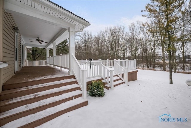 snow covered deck featuring ceiling fan