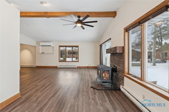 unfurnished living room featuring an AC wall unit, a wood stove, and a baseboard heating unit