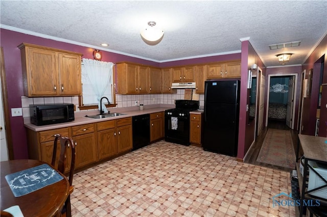 kitchen featuring sink, crown molding, black appliances, a textured ceiling, and decorative backsplash