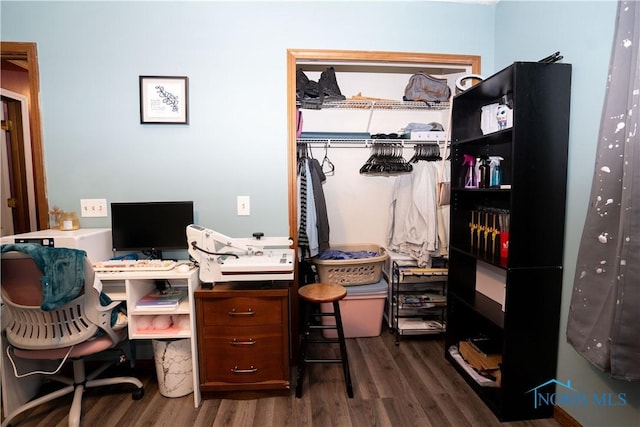 office with dark hardwood / wood-style floors