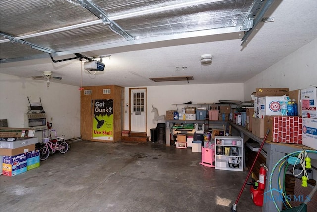 garage featuring a garage door opener