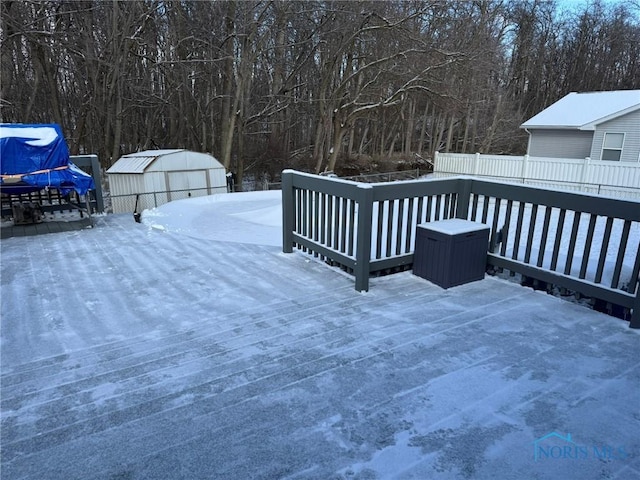 view of snow covered deck