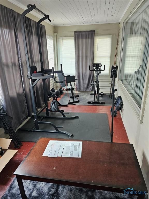 workout room with wooden ceiling