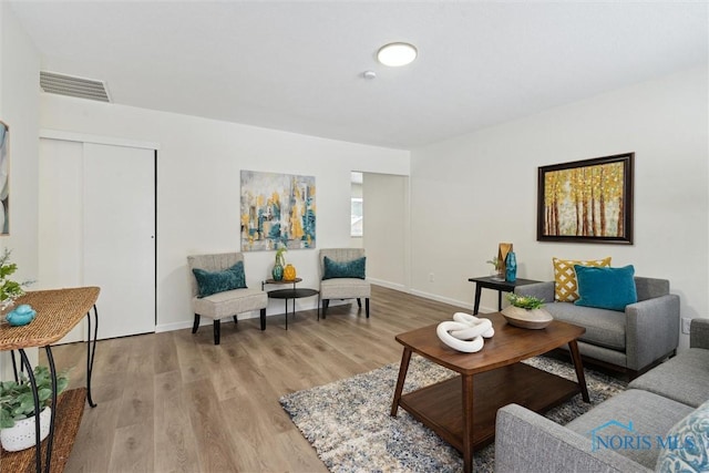 living room featuring light wood-type flooring