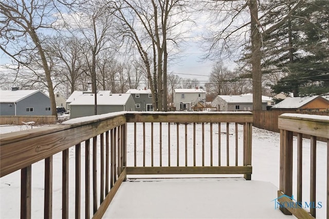 view of snow covered deck