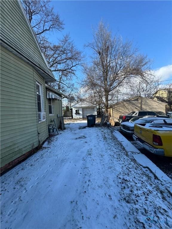 view of yard covered in snow