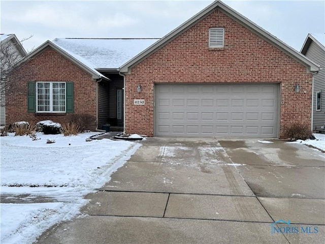 front of property with a garage