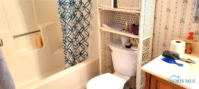 full bathroom featuring vanity, toilet, and shower / bath combo with shower curtain