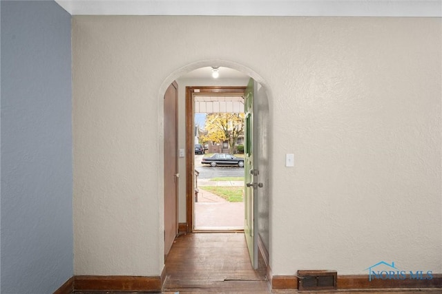 doorway to outside with hardwood / wood-style floors