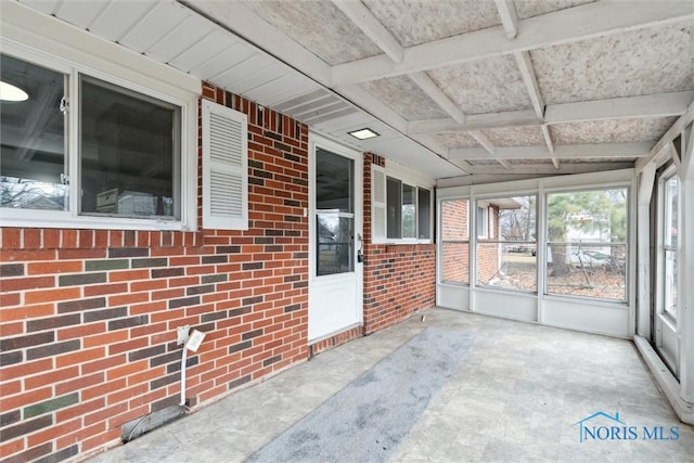 view of unfurnished sunroom