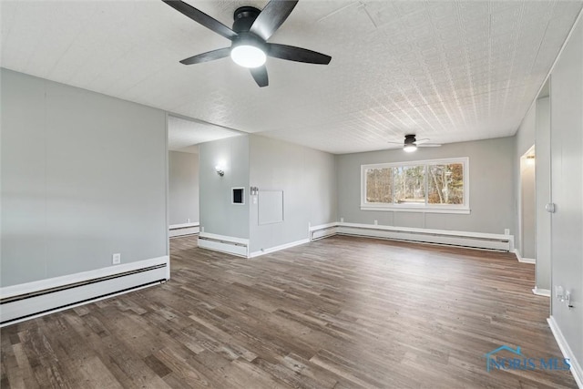 unfurnished living room with a ceiling fan, a baseboard radiator, baseboards, and wood finished floors