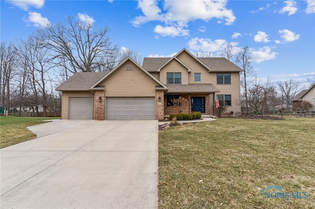 view of front of home featuring a garage and a front lawn