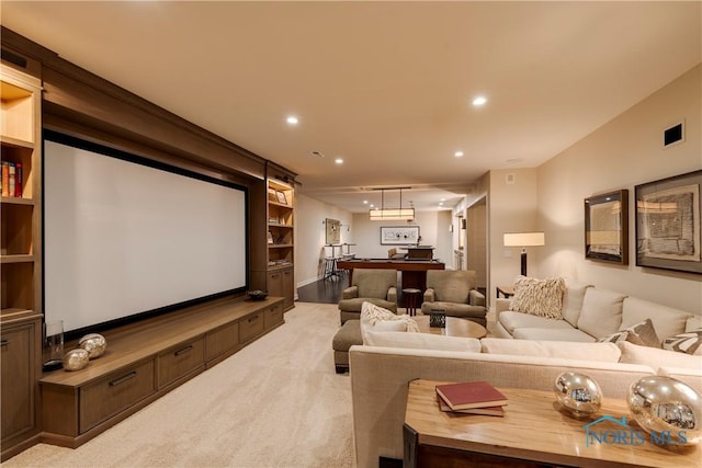 home theater featuring light carpet