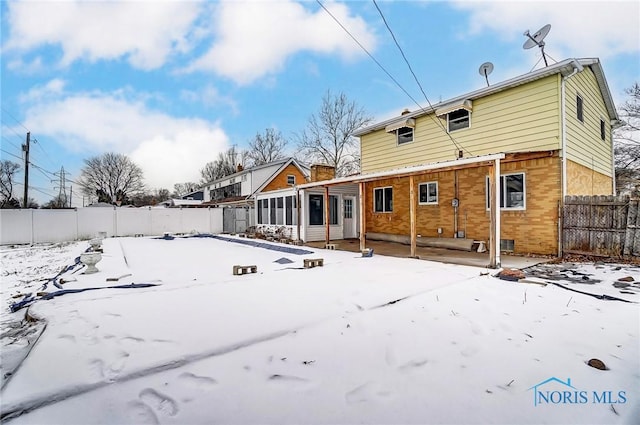 view of snow covered property