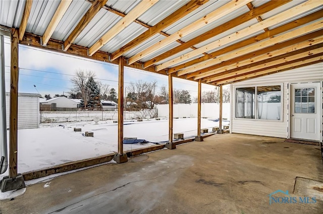 view of snow covered patio