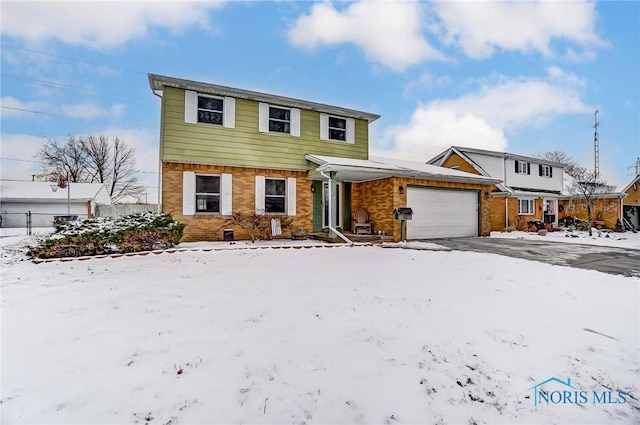 view of front of home with a garage