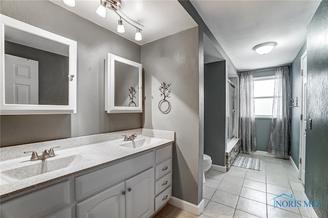 full bathroom with tile patterned flooring, vanity, shower / bathtub combination, and toilet