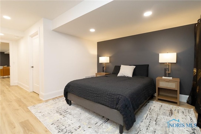 bedroom featuring light hardwood / wood-style flooring