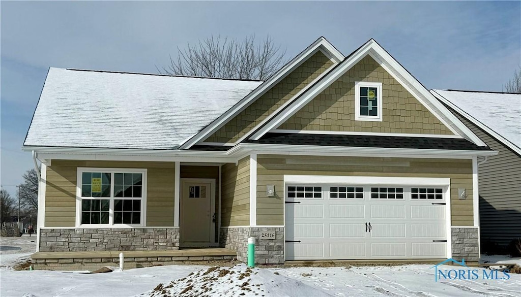 craftsman-style house featuring a garage