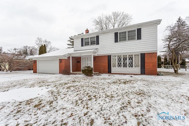 front of property featuring a garage