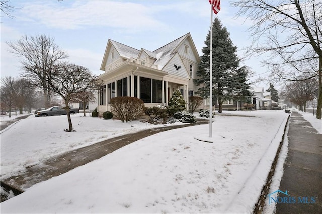 view of snow covered property