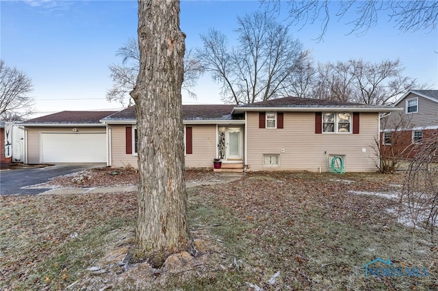 split level home featuring a garage