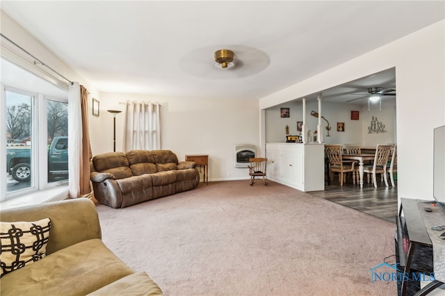 615 Lincolnshire Ln, Findlay, OH 45840 - living room with heating unit, carpet floors, and ceiling fan