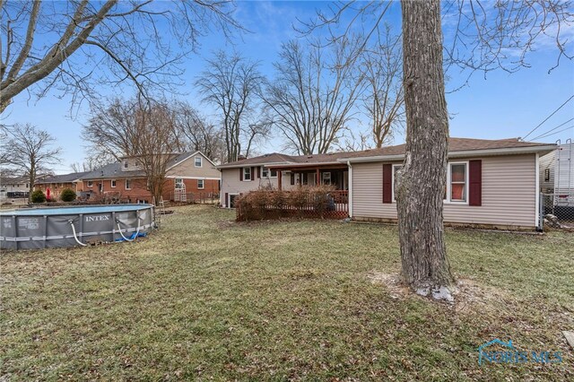 615 Lincolnshire Ln, Findlay, OH 45840 - back of property featuring a yard