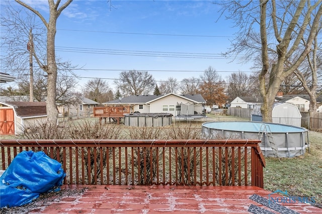 615 Lincolnshire Ln, Findlay, OH 45840 - deck featuring a shed