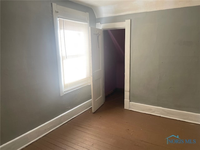 spare room featuring hardwood / wood-style flooring