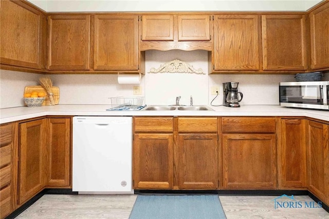 kitchen with sink and dishwasher