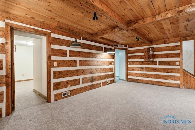 additional living space featuring carpet flooring, wooden walls, and wood ceiling