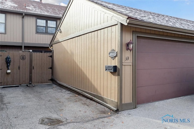 exterior space featuring a garage