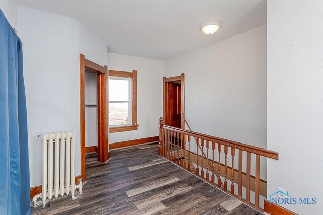 11608 Reitz Rd, Perrysburg, OH 43551 - interior space with radiator heating unit, baseboards, and wood finished floors